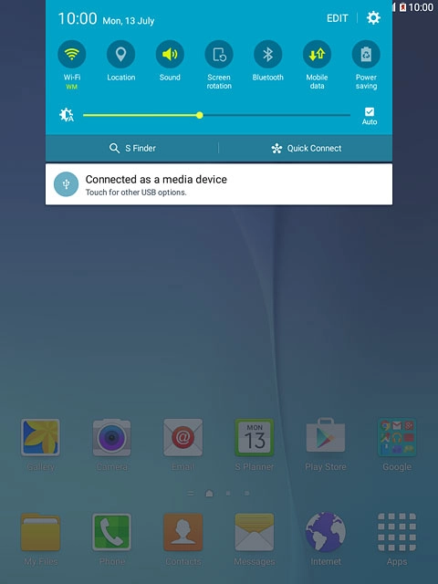 Slide your finger down the display starting from the top edge of your tablet.Press Connected as a media device.