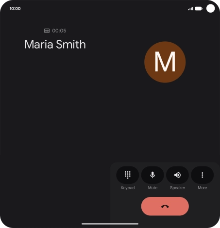 Press the end call icon.