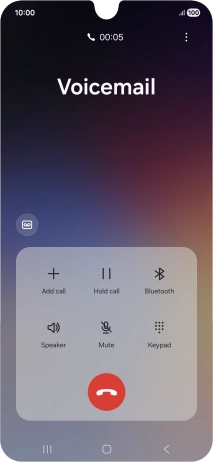 Press the end call icon.