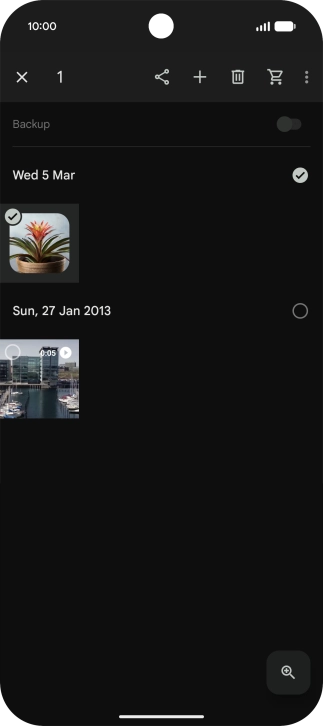 Press the required pictures or videos to select them.