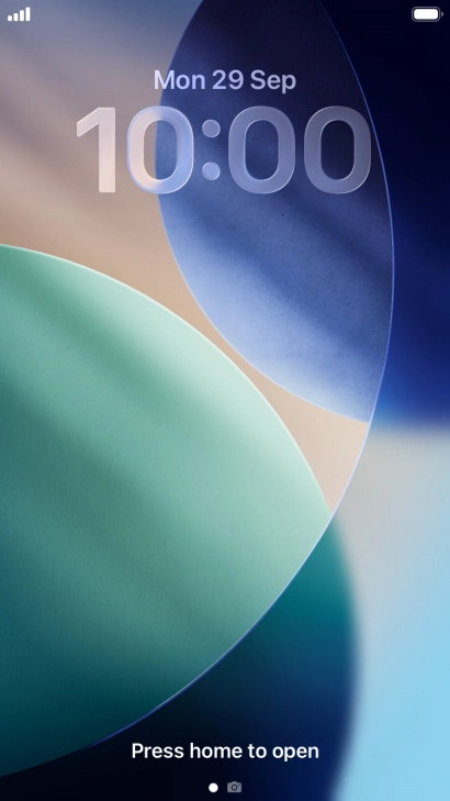 Press and hold anywhere on the lock screen.