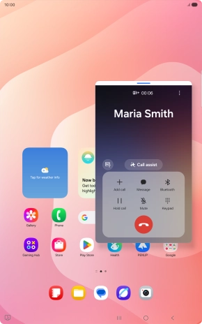 Press the end call icon.