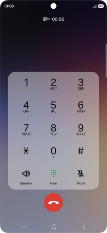 Press the end call icon.
