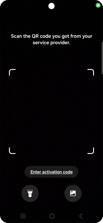 Place the QR code you've received inside the phone camera frame to scan the code. Your eSIM is transferred to your new phone over the internet.