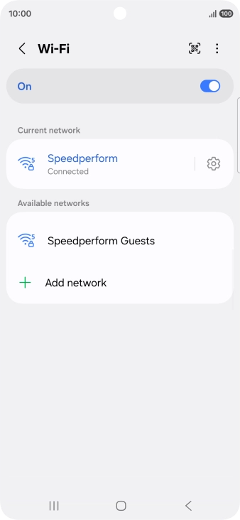 Press the settings icon next to the Wi-Fi network you're connected to.