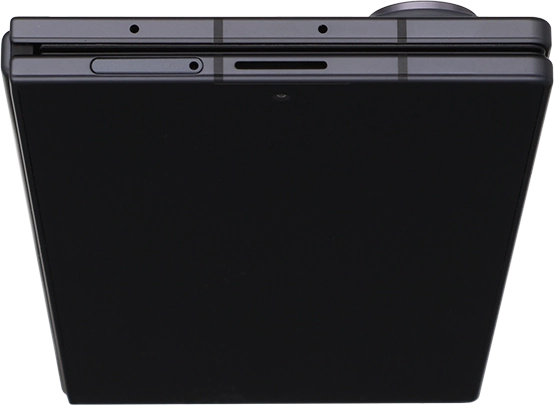 Insert the opener into the small hole in the SIM holder.