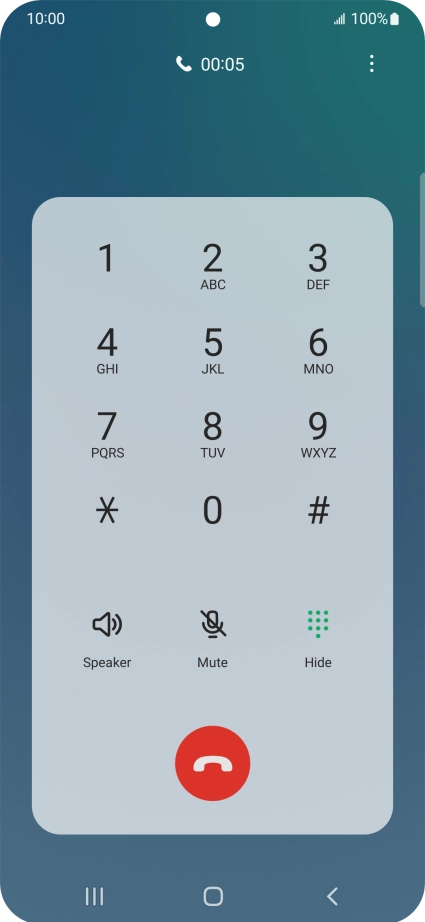 Press the end call icon.