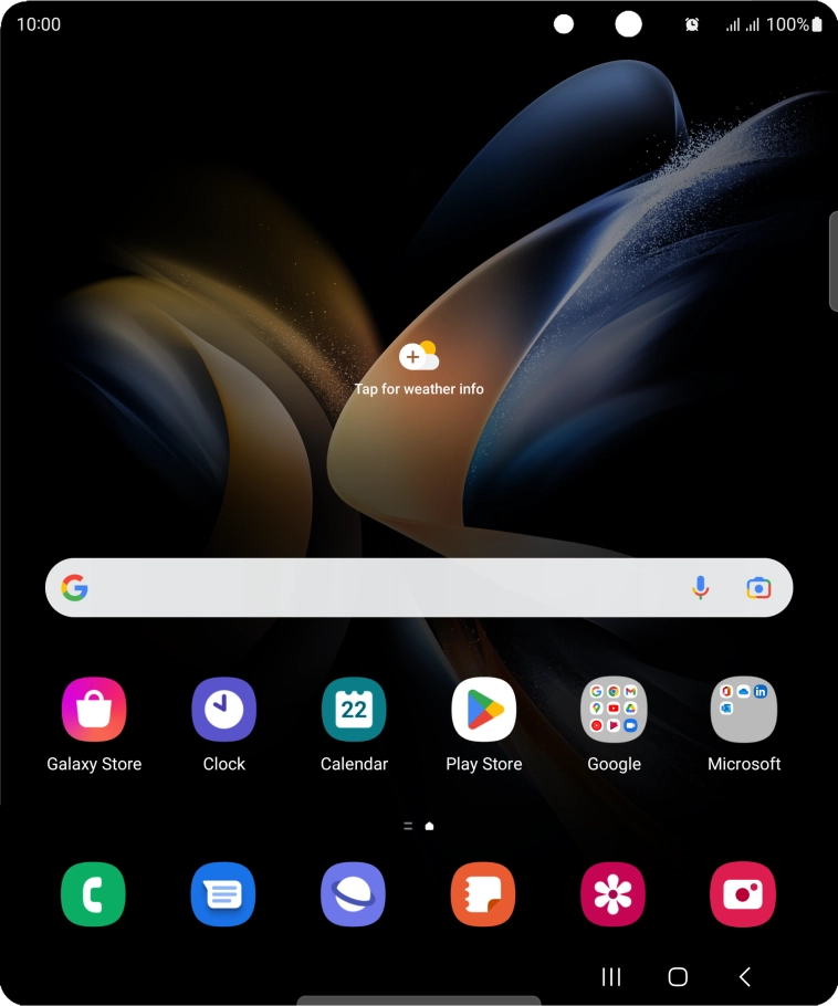 The alarm icon shows that the alarm is set.