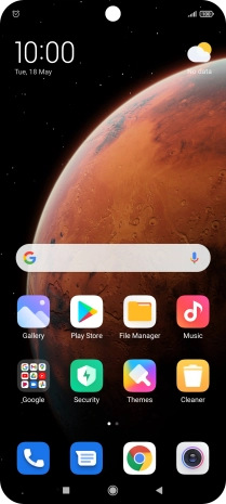 The alarm icon shows that the alarm is set.