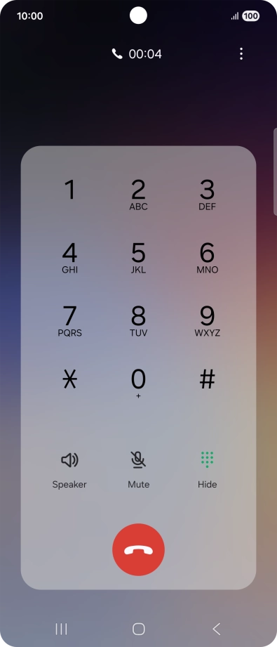 Press the end call icon.