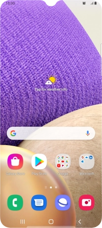 The alarm icon shows that the alarm is set.