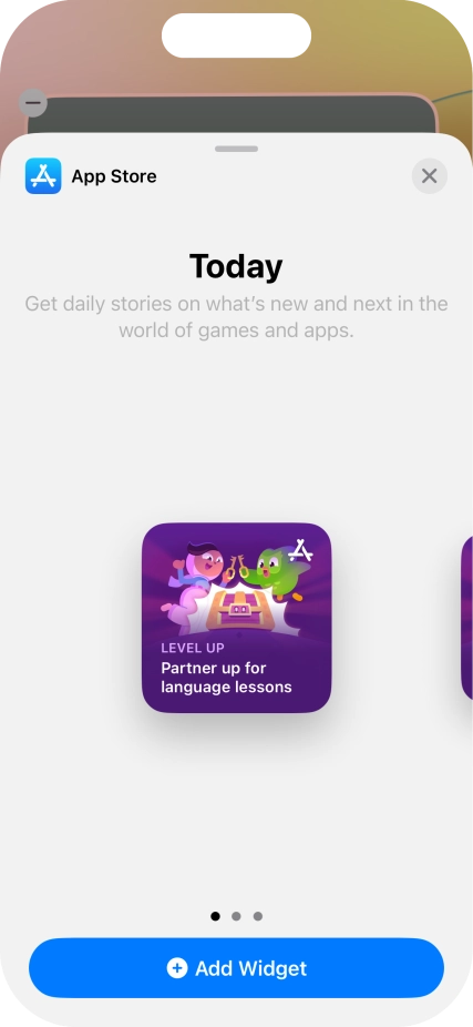 Slide your finger right or left on the screen to select the required widget size.