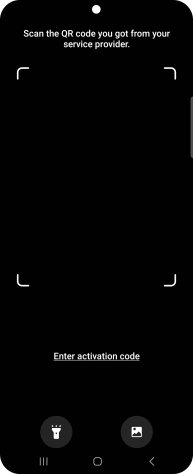Place the QR code you've received inside the phone camera frame to scan the code. Your eSIM is transferred to your new phone over the internet.