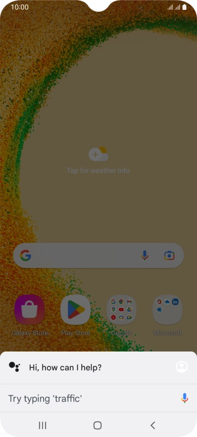 Press and hold the Home key.