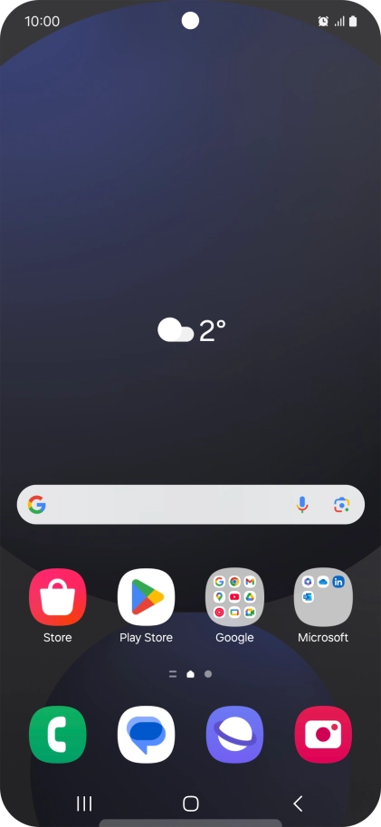The alarm icon shows that the alarm is set.