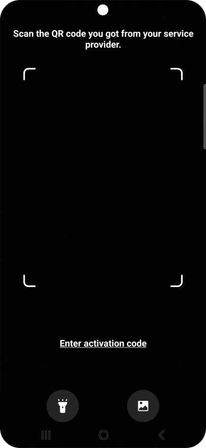 Place the QR code you've received inside the phone camera frame to scan the code. Your eSIM is transferred to your new phone over the internet.