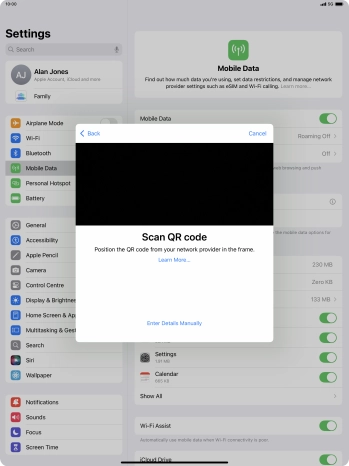 Place the QR code you've received inside the tablet camera frame to scan the code. Your eSIM is transferred to your new tablet over the internet.
