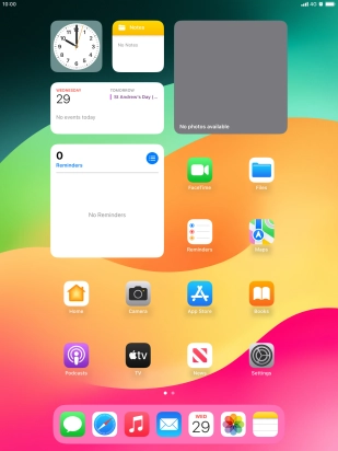 The alarm icon shows that the alarm is set.