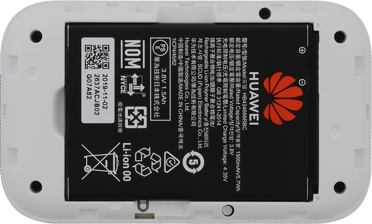 Take hold of the left side of the battery and remove it.