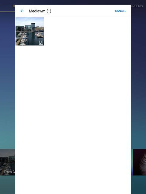 Go to the required folder.Press the required picture.
