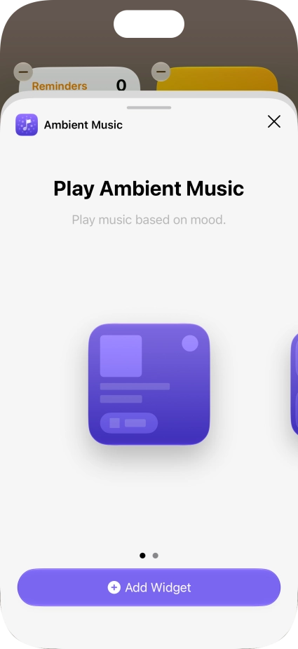 Slide your finger right or left on the screen to select the required widget size.