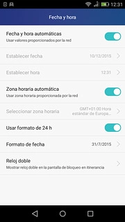 Pulsa Zona horaria automática hasta que aparezca en la pantalla que la función está activada.