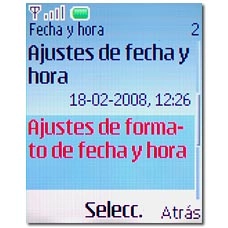 Vaya a Ajustes de formato de fecha y hora y pulse la tecla de navegación.