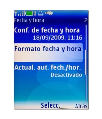 Vaya a Formato fecha y hora y pulse la tecla de navegación.