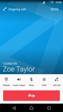 Press the end call icon.
