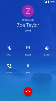 Press the end call icon.