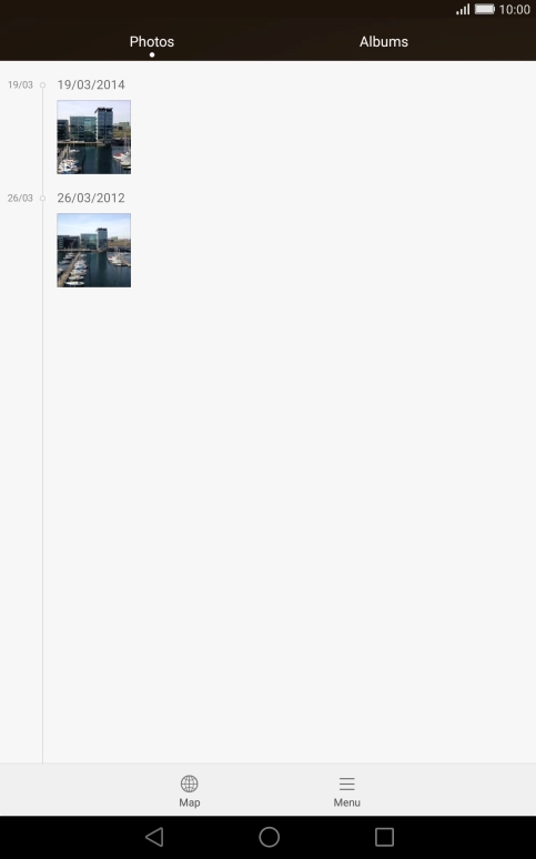 Press Photos and go to the required folder.