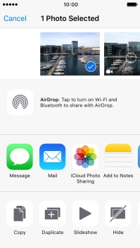 Press the AirDrop icon to turn on the function. Press the AirDrop icon to turn on the function.