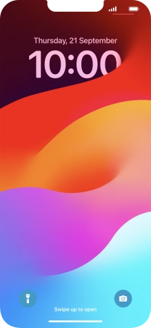 Press and hold anywhere on the lock screen.