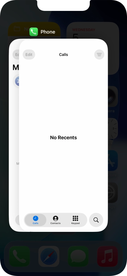 Slide upwards on the required application to end it. Slide upwards on the required application to end it.