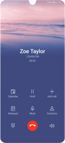 Press the end call icon.