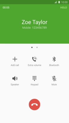 Press the end call icon.