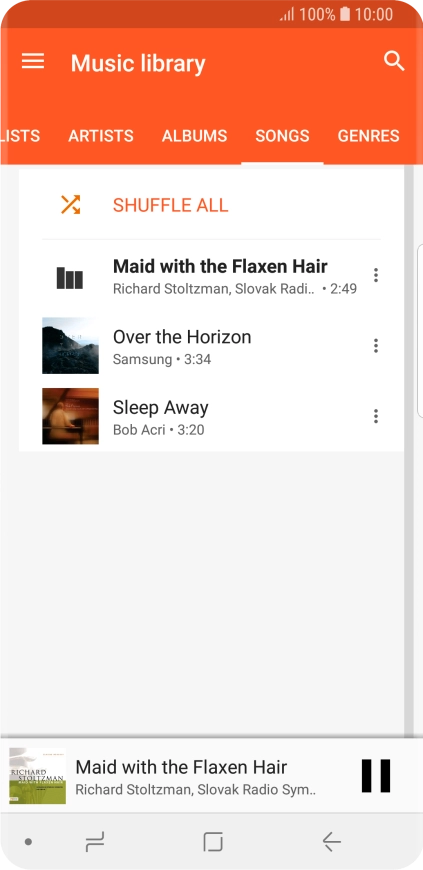 Press the song title at the bottom of the screen.