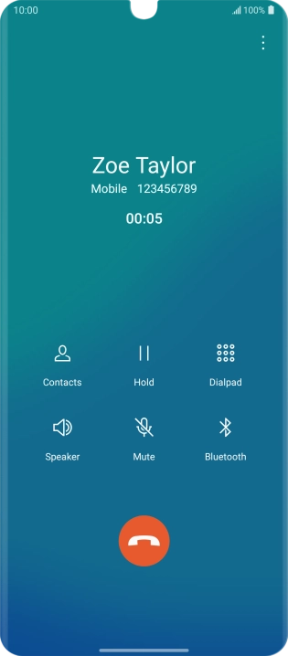 Press the end call icon.