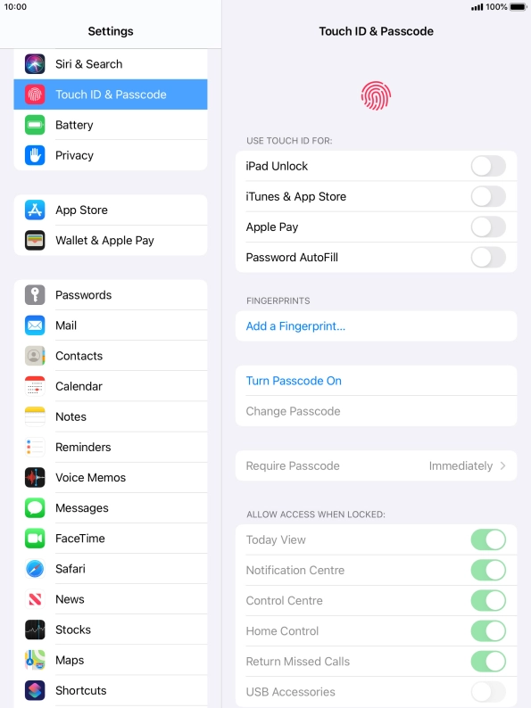 Press Turn Passcode On and key in a lock code of your own choice twice.