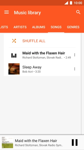 Press the song title at the bottom of the screen.