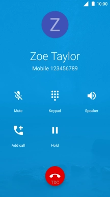 Press the end call icon.