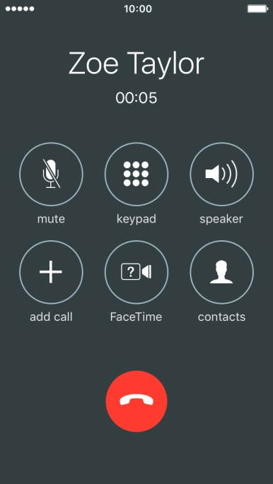 Press the end call icon.