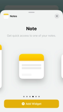 Slide your finger right or left on the screen to select the required widget size.
