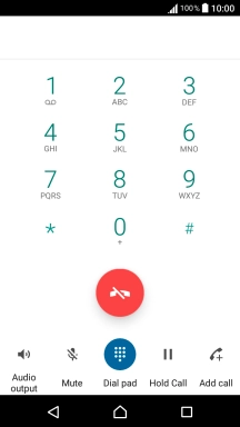 Press the end call icon.