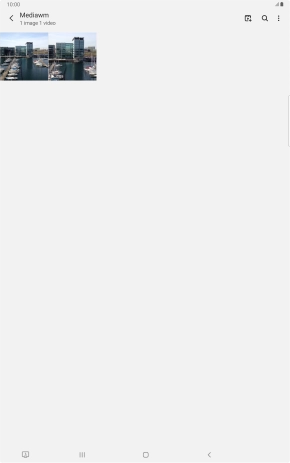 Press and hold any picture or video clip.