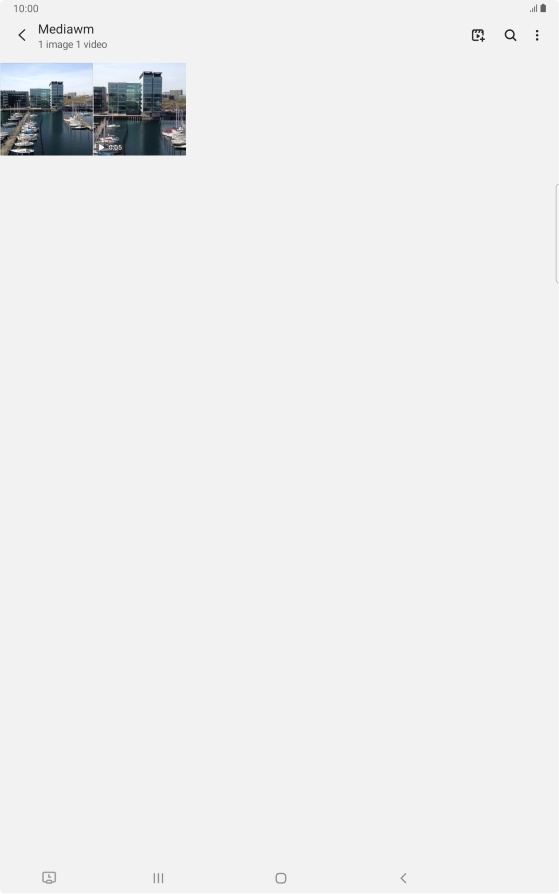 Press and hold any picture or video clip.