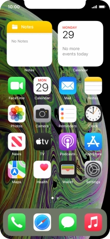 Slide your finger downwards starting from the top right side of the screen.
