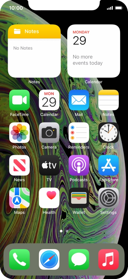 Slide your finger downwards starting from the top right side of the screen.