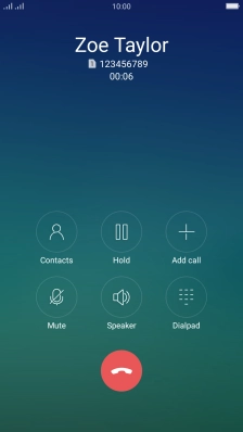 Press the end call icon.