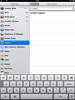 Press the required time zone.